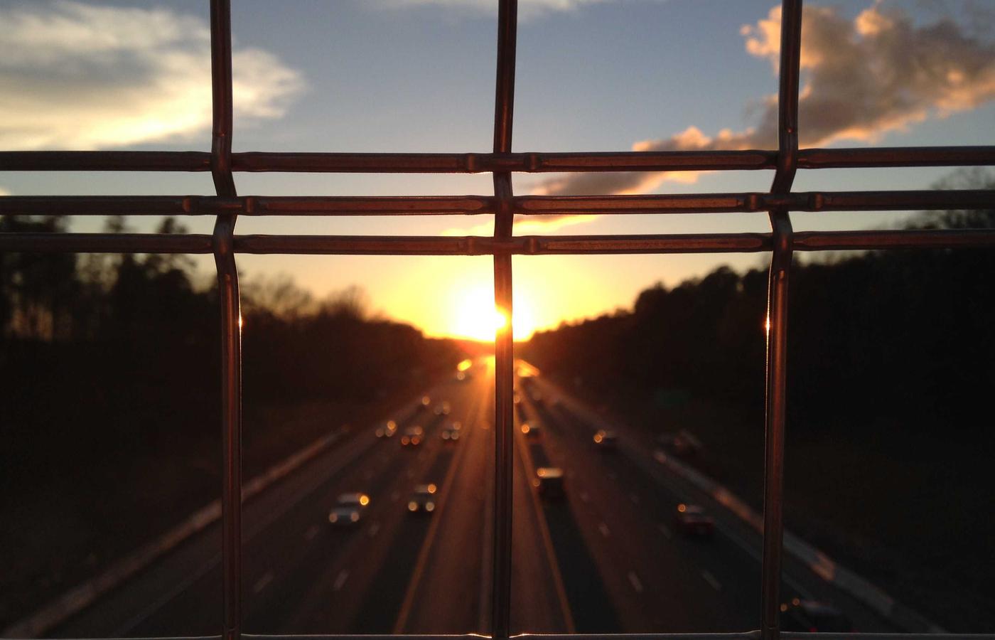 The Stillwater Inn, a charming New England bed and breakfast nestled among autumn trees along the Ottauquechee River in Woodstock, Vermont